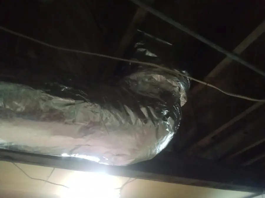 Insulated duct bend overhead