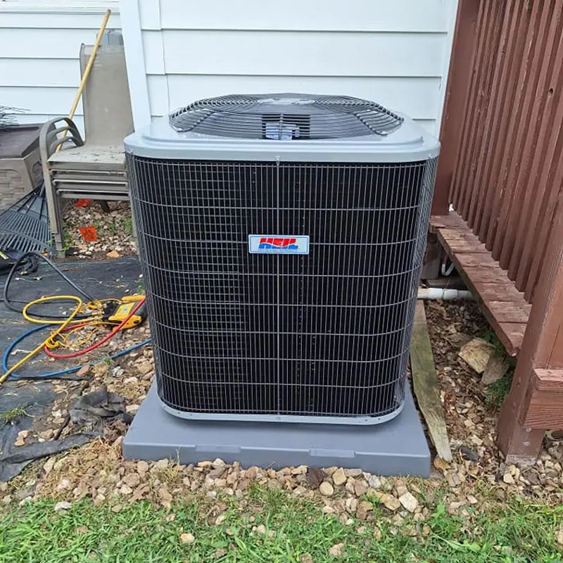 Heil air conditioner outdoor unit on a concrete pad
