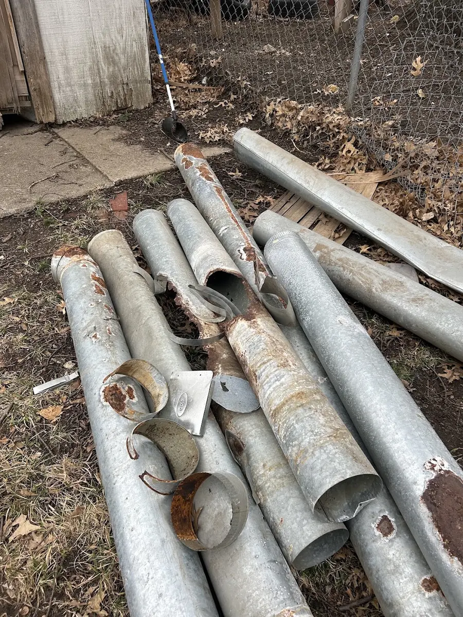 Old galvanized duct pulled out and set aside